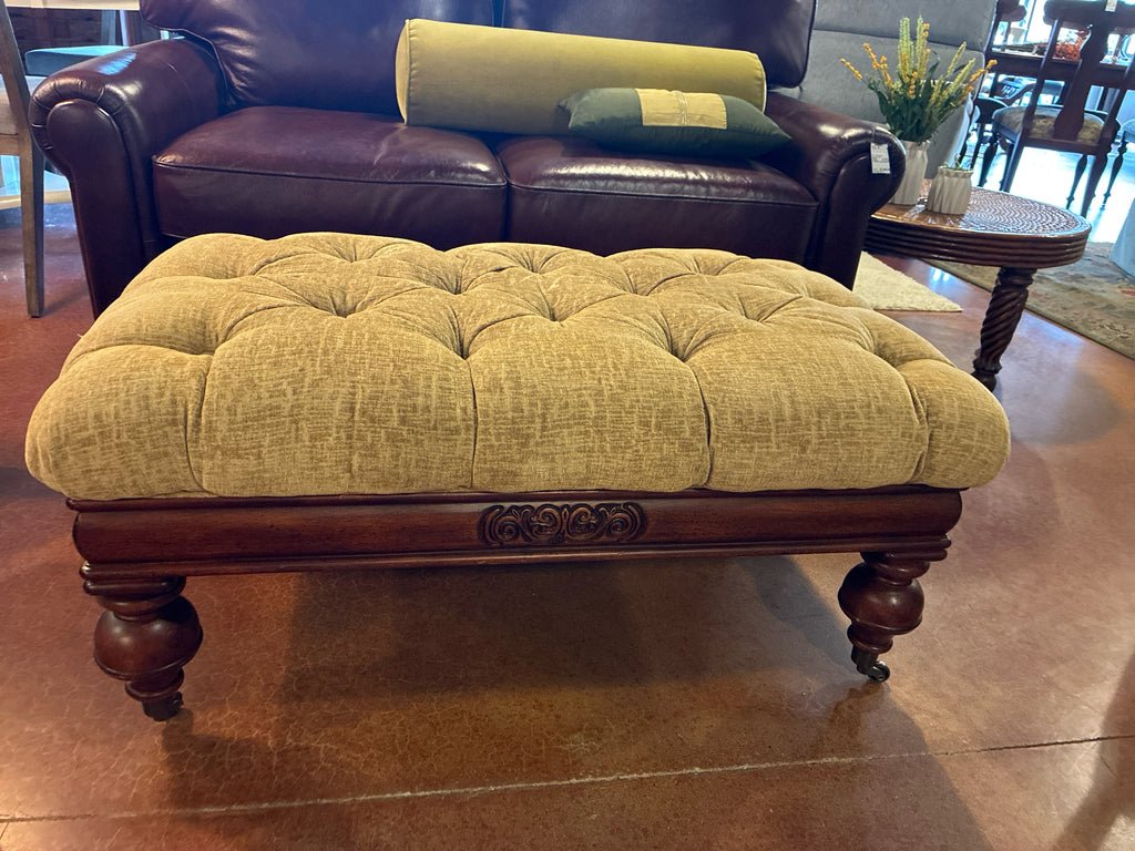Ottoman|Elegant|Tufted Upholstered|Carved wood apron, turned legs, casters