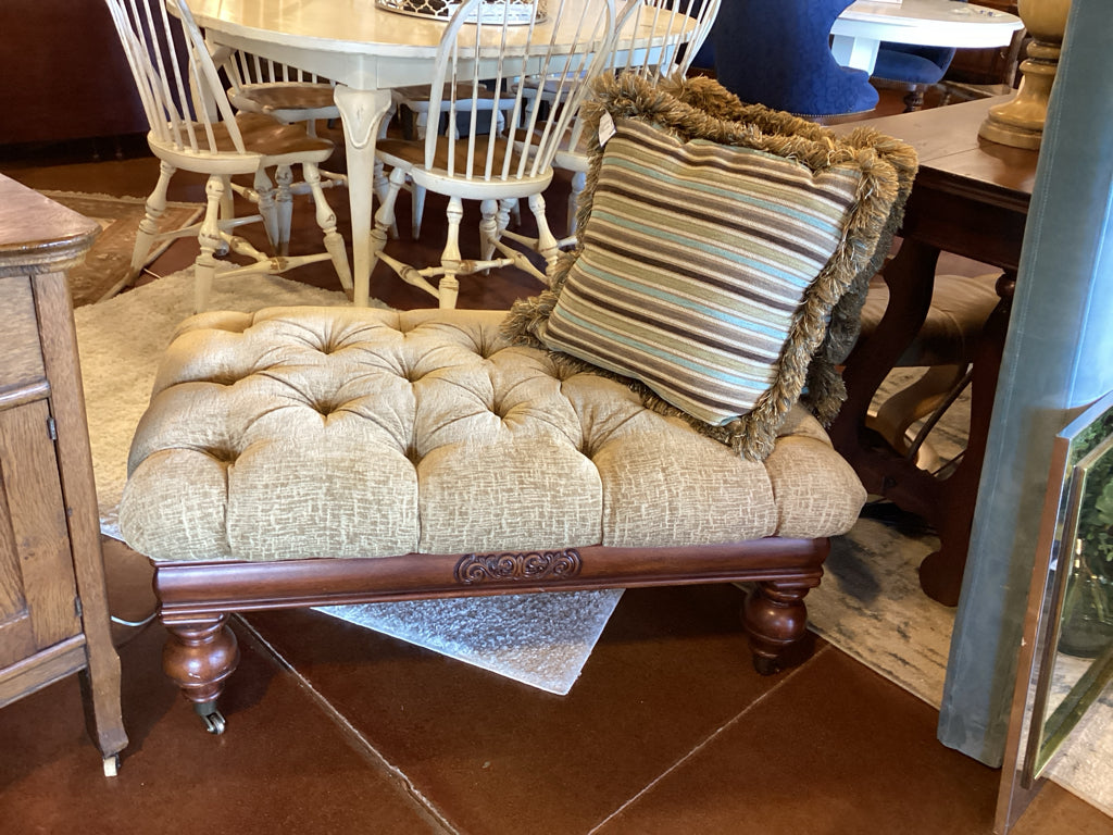 Ottoman|Elegant|Tufted Upholstered|Carved wood apron, turned legs, casters